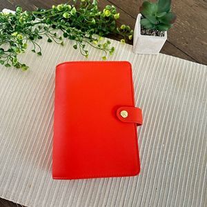 Kikki.K Orange Saffiano Planner Organizer  6 Ring Binder 7.5” x 5.5”